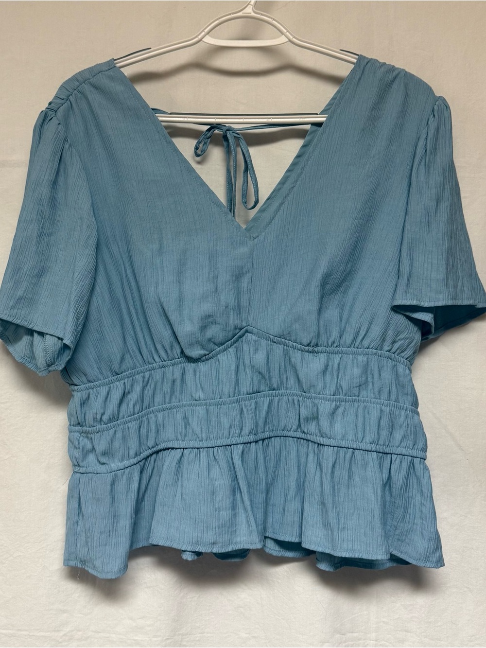 Source Unknown Dusty Blue V-Neck Peplum Blouse